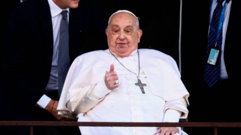 Pope Francis gestures during his first public appearance in five weeks, on the day he is set to be discharged from Gemelli Hospital, in Rome - REUTERSpix