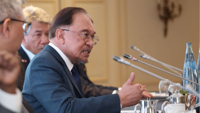 Prime Minister Datuk Seri Anwar Ibrahim at the Roundtable Meeting with Captains of Industry in Paris today. - BERNAMA