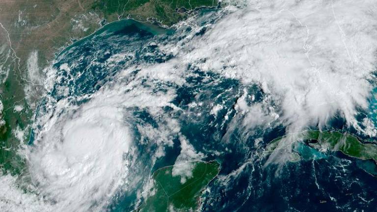 A satellite image shows Tropical Storm Milton intensifying and on track to become a hurricane before its expected landfall in Florida, in the Gulf of Mexico October 6, 2024. - REUTERSPIX