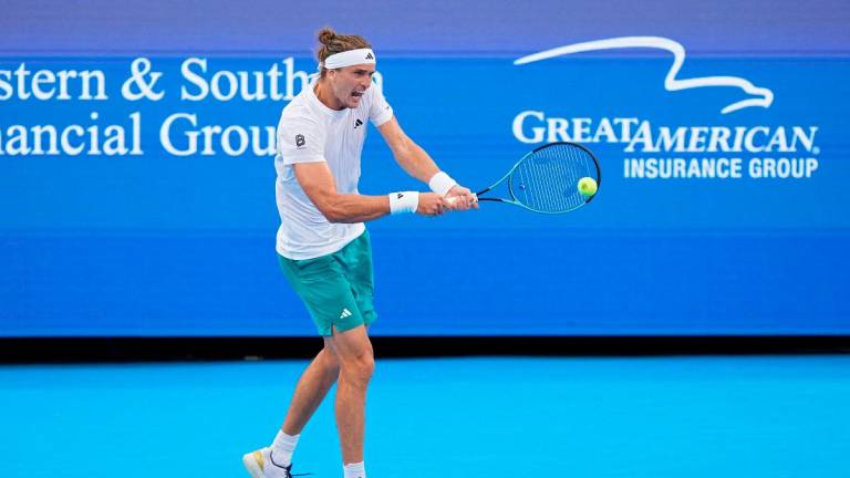 Alexander Zverev of Germany plays a backhand during the match against Brandon Nakashima of the United States during Day 6 of the Cincinnati Open. - Dylan Buell/Getty Images/AFP