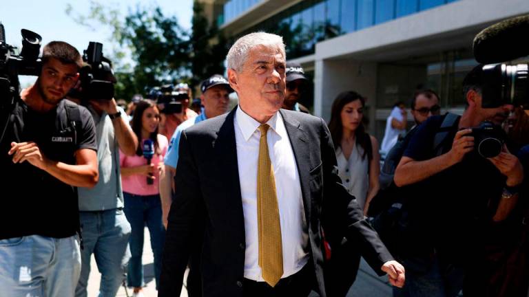 Former Portuguese Prime Minister Jose Socrates leaves court after the first session of his high-level corruption case at the justice campus in Lisbon on July 3, 2025. (Photo by FILIPE AMORIM / AFP)