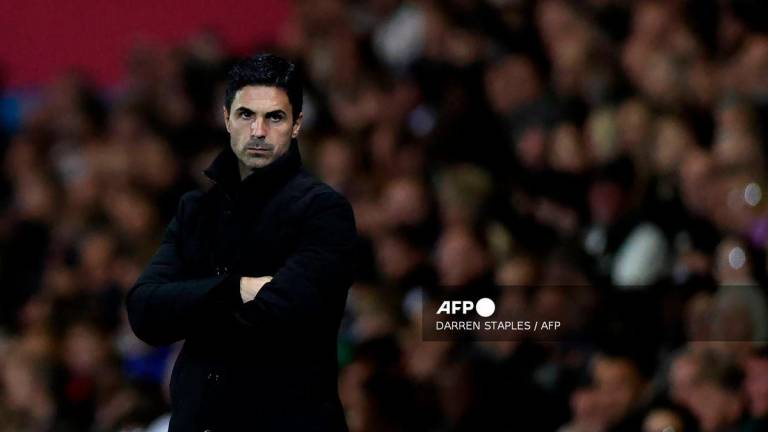 Arsenal's Spanish manager Mikel Arteta watches the players from the touchline during the English League Cup third round football match between Port Vale and Arsenal at Vale Park in Stoke-on-Trent, central England on September 24, 2025. - AFP