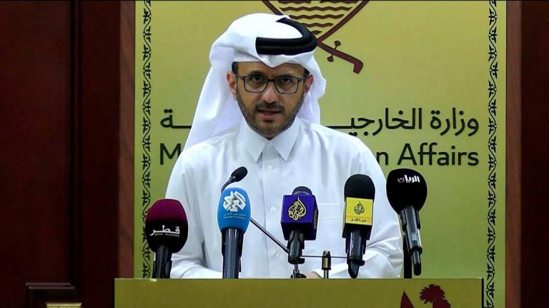 This frame grab from AFPTV footage shows Qatari foreign ministry spokesman Majed al-Ansari speaking during a media briefing in Doha on June 17, 2025. - AFPPIX