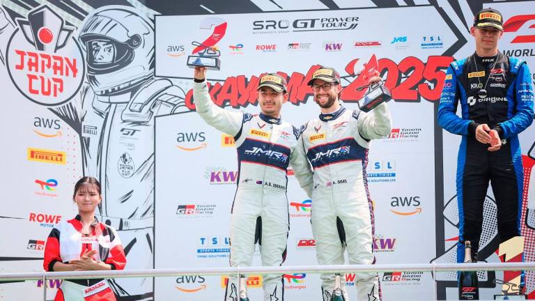 HH Prince Abu Bakar Ibrahim (left) and Alex Sims on the podium. – Hyperepublic