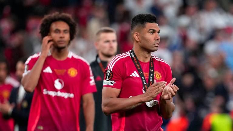 Manchester United's Brazilian midfielder #18 Casemiro reacts after the UEFA Europa League final football match between Tottenham Hotspur and Manchester United at San Mames stadium in Bilbao on May 21, 2025. - AFPPIX