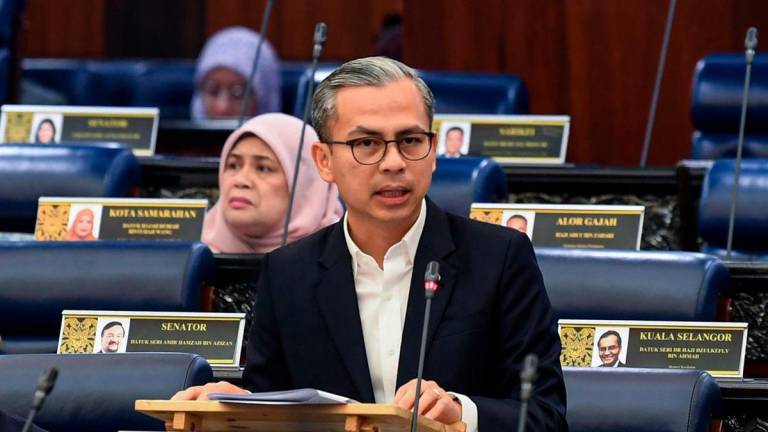Communications Minister Datuk Fahmi Fadzil. - BERNAMA