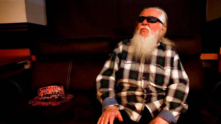 FILE PHOTO: Jazz musician Hermeto Pascoal sits before performing on stage at the Sugar Club, in Dublin, Ireland July 12, 2023. REUTERS/Clodagh Kilcoyne/File Photo