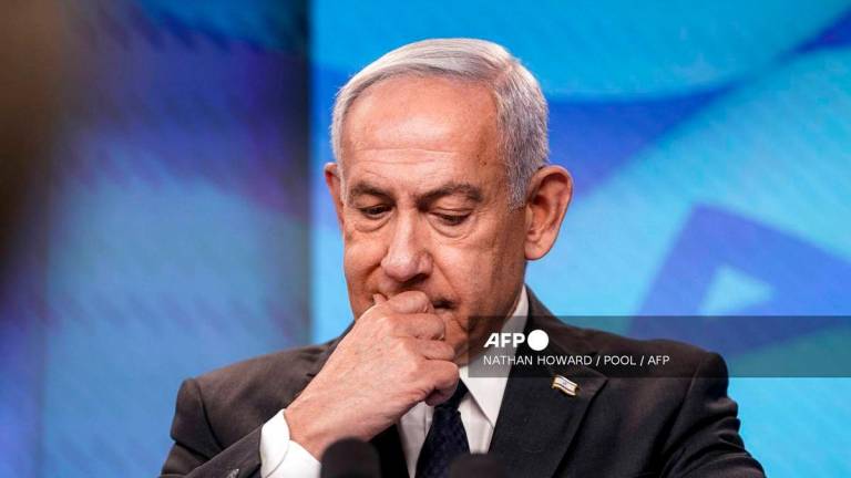 Israel’s Prime Minister Benjamin Netanyahu - (Photo by Nathan Howard / POOL / AFP)