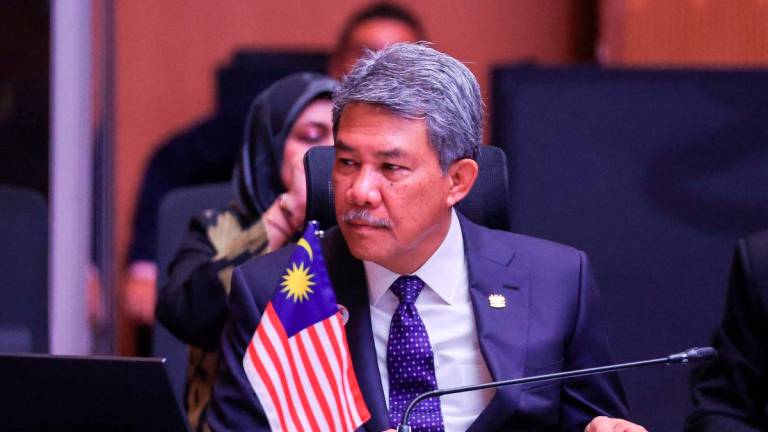 Malaysia's Minister of Foreign Affairs Mohamad Hasan attends the Association of Southeast Asian Nations (ASEAN) Post-Ministerial Conference with the United Kingdom during the 58th ASEAN Foreign Ministers’ meeting and related meetings at the Convention Centre in Kuala Lumpur on July 11, 2025. - POOL via AFP