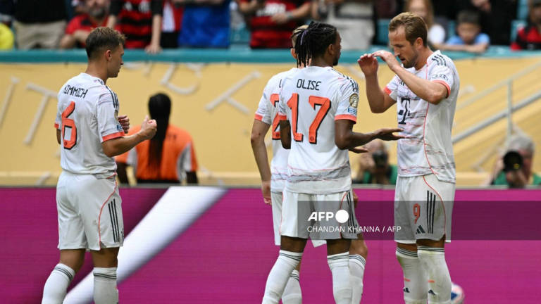 Bayern Munich’s English forward #09 Harry Kane (R) celebrates with teammates after scoring his team’s fourth goal during the FIFA Club World Cup 2025 round of 16 football match between Brazil’s Flamengo and Germany’s Bayern Munich at the Hard Rock Stadium in Miami on June 29, 2025. - AFP