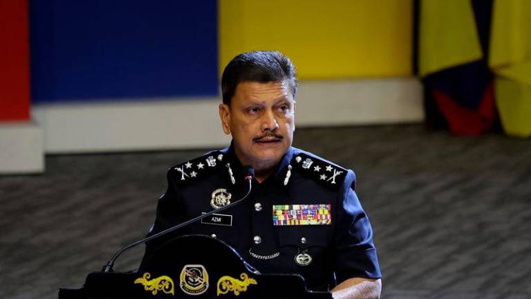Pengarah Jabatan Keselamatan Dalam Negeri dan Ketenteraman Awam (JKDNKA) Bukit Aman Datuk Seri Azmi Abu Kassim - Photo by BERNAMA