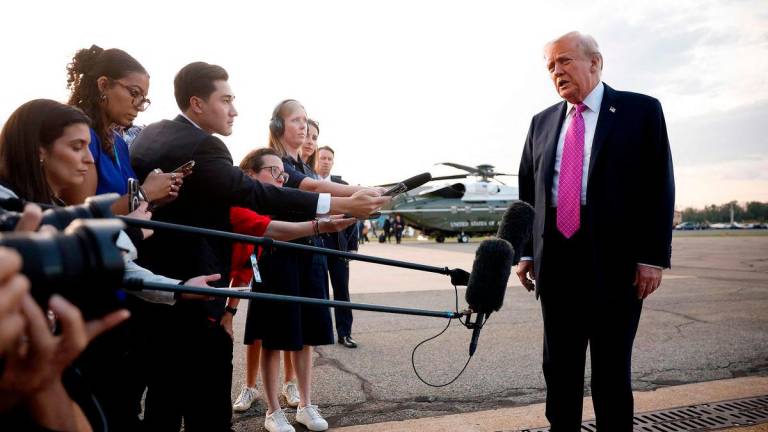 President Donald Trump speaks to reporters before boarding Air Force One at Morristown Airport on September 14, 2025 in Morristown, New Jersey. Trump is returning to Washington, DC after a trip to New York and his golf club in Bedminster, New Jersey. Kevin Dietsch/Getty Images/AFP (Photo by Kevin Dietsch / GETTY IMAGES NORTH AMERICA / AFP)