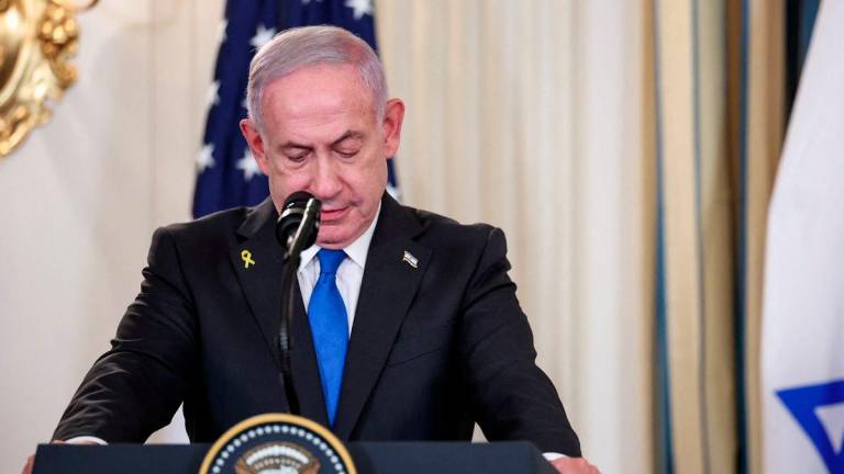 Israeli Prime Minister Benjamin Netanyahu attends a joint press conference with U.S. President Donald Trump (not pictured) in the State Dining Room at the White House in Washington, D.C., U.S., September 29, 2025. - REUTERSPIX