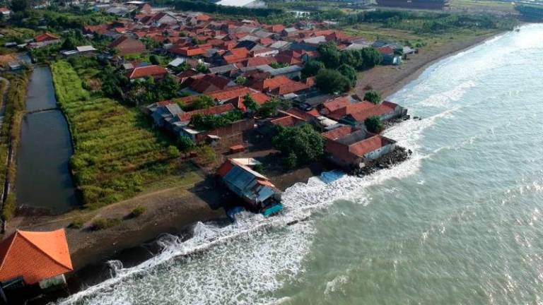 Aerial photo of houses damaged by abrasion on the North Coast, Sidaharja Village, Tegal District, Central Java. Photo: Antara