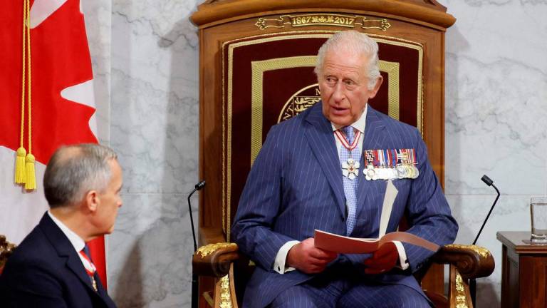 Britain's King Charles III speaks as Canadian Prime Minister Mark Carney looks on during the opening the first session of the 45th Parliament of Canada at the Senate of Canada in Ottawa on May 27, 2025. AFPpix