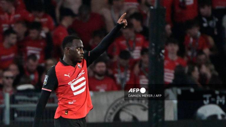 Rennes’ French forward #09 Arnaud Kalimuendo celebrates after scoring during the French L1 football match between Stade Rennais FC and OGC Nice at Roazhon Park stadium in Rennes, western France on May 10, 2025. - AFP