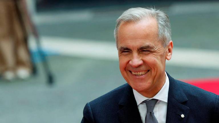 Canadian Prime Minister Mark Carney smiles as he meets with Italian Prime Minister Giorgia Meloni at Palazzo Chigi, in Rome, Italy, May 17, 2025. REUTERSpix