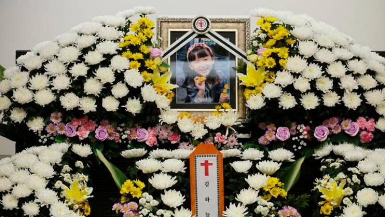 A portrait of Kim Ha-neul is set up at a funeral hall in Daejeon, Tuesday. Photo: Yonhap