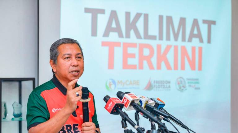 Chief Executive Officer of Humanitarian Care Malaysia (MyCARE), Kamarul Zaman Shaharul Anwar, at a press conference at MyCARE’s headquarters here today. – BERNAMA