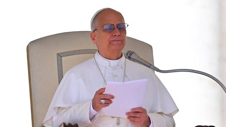 Pope Leo XIV delivers a speech during the weekly general audience at St Peter’s Square in the Vatican on October 8, 2025. - Andreas SOLARO / AFP