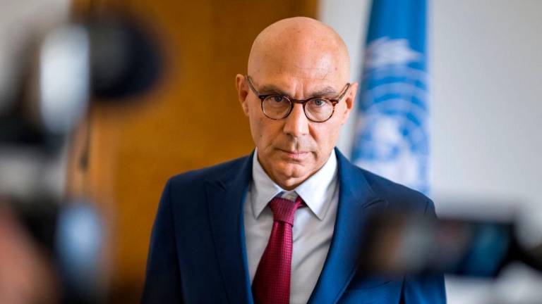 UN High Commissioner for Human Rights Volker Turk looks on during a statement at the United Nations Offices in Geneva, on September 16, 2025. (Photo by Fabrice COFFRINI / AFP)