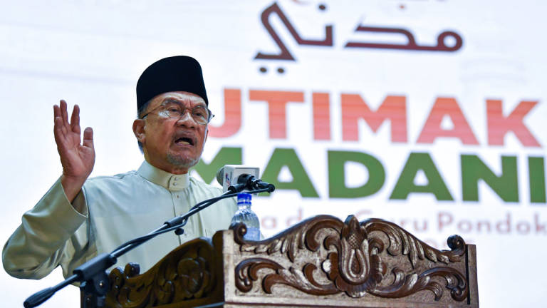 Prime Minister Datuk Seri Anwar Ibrahim delivers a speech at the Opening Ceremony of the 2025 *Ijtima’ MADANI* Ulama and Kelantan Pondok Teachers Gathering at the Professional Hall, Universiti Teknologi MARA (UiTM) Machang Campus today. – BERNAMA
