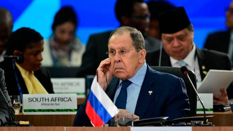 Russia’s Foreign Minister Sergei Lavrov attends a plenary session of the BRICS summit in Rio de Janeiro, Brazil, on July 7, 2025. (Photo by Pablo PORCIUNCULA / AFP)