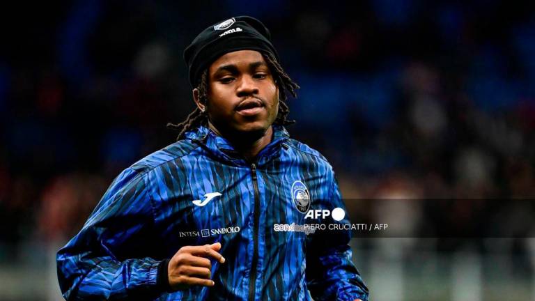 Atalanta's Nigerian forward #11 Ademola Lookman warms up ahead of the Italian Serie A football match between AC Milan and Atalanta Bergamo at the San Siro stadium in Milan, on April 20, 2025. - AFP