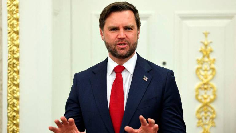 U.S. Vice President JD Vance speaks as U.S. President Donald Trump (not pictured) and Apple CEO Tim Cook (not pictured) present Apple’s announcement of a $100 billion investment in U.S. manufacturing, in the Oval Office at the White House in Washington, D.C., U.S., August 6, 2025. REUTERS/Jonathan Ernst