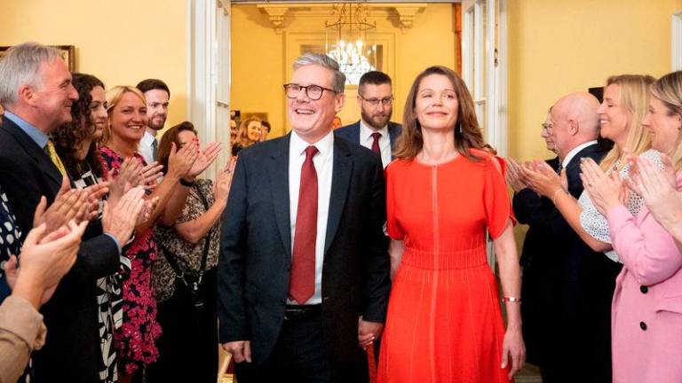 Prime Minister Sir Keir Starmer and his wife Victoria Starmer - REUTERSpix