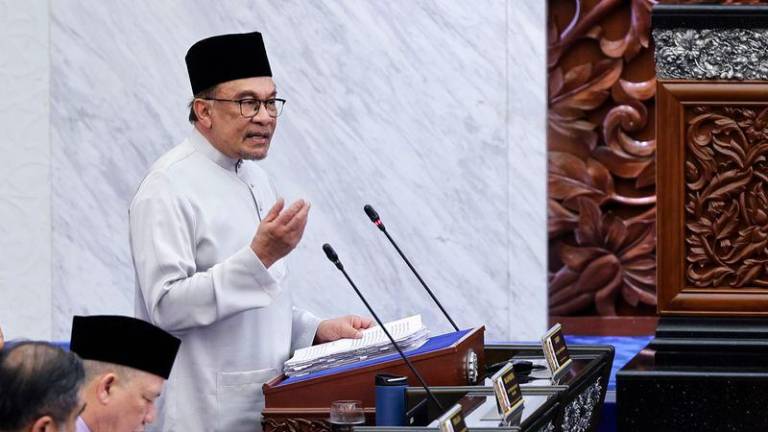 Prime Minister Datuk Seri Anwar Ibrahim presenting Budget 2025 on Friday - BERNAMApix