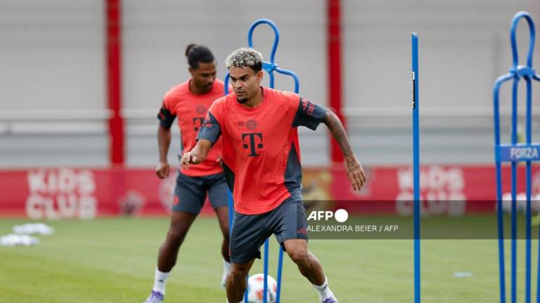 Bayern Munich's Colombian forward #14 Luis Diaz and Bayern Munich's German forward #07 Serge Gnabry attend a training session at their training ground in Munich, southern Germany, on July 31, 2025. - AFPPIX
