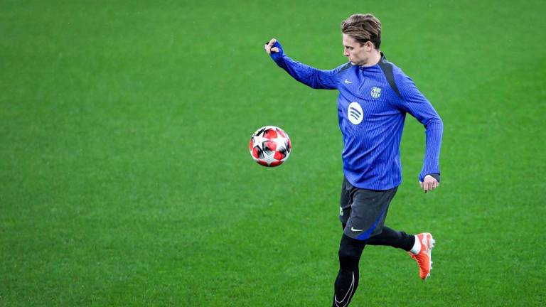 Barcelona’s Dutch midfielder #21 Frenkie De Jong. - FILIPE AMORIM / AFP