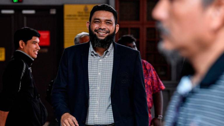 Former UMNO Youth executive committee member Wan Muhammad Azri Wan Deris, known as Papagomo - Photo by BERNAMA