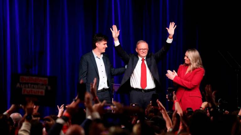 :Australia’s Prime Minister Anthony Albanese celebrates at a Labor party election night event, after local media projected the Labor Party’s victory, on the day of the Australian federal election, in Sydney, Australia, REUTERSpix