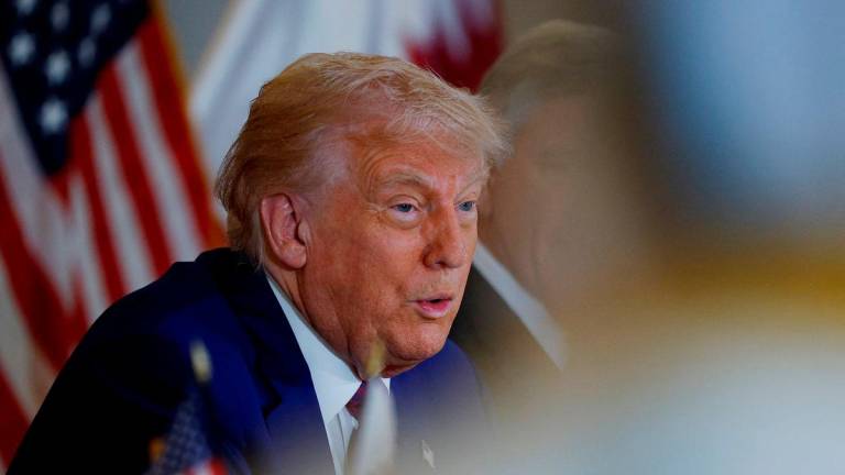 U.S. President Donald Trump speaks during a roundtable discussion in Doha, Qatar, May 15, 2025. REUTERSpix