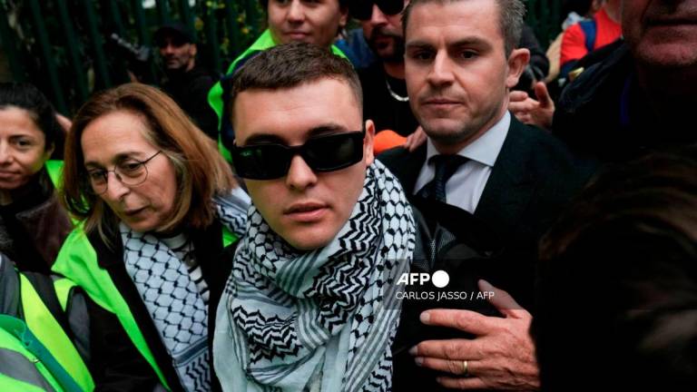Member of the band Kneecap Liam O'Hanna who performs under the stage name Mo Chara, leaves Woolwich Crown Court in south east London on September 26, 2025. - AFP