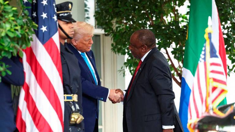 U.S. President Donald Trump welcomes South African President Cyril Ramaphosa to the White House in Washington, D.C., U.S., May 21, 2025. REUTERSpix