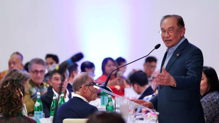 Prime Minister Datuk Seri Anwar Ibrahim delivers his speech at the Majlis Ramah Mesra Bersama Diaspora Malaysia here, on Tuesday. - BERNAMAPIX