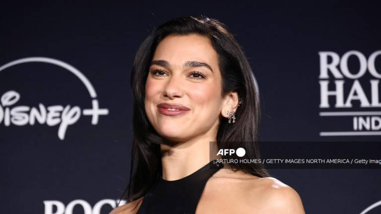 Dua Lipa poses in the press room during the 2024 Rock &amp; Roll Hall Of Fame Induction Ceremony streaming on Disney+ at Rocket Mortgage Fieldhouse on October 19, 2024 in Cleveland, Ohio. - Getty Images via AFP
