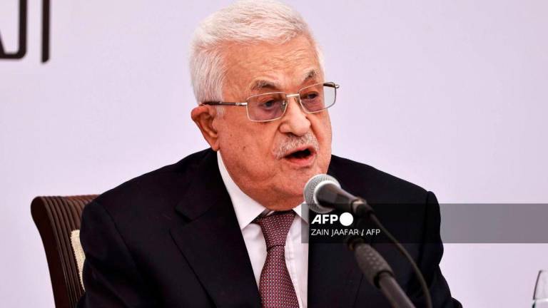 Palestinian Authority President Mahmud Abbas delivers a speech during the opening of the Istishsari cancer centre in Ramallah on May 14, 2025. - AFP