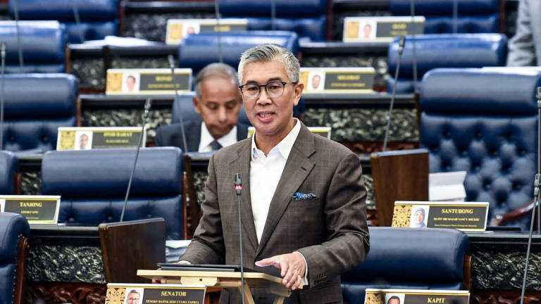 Minister of Investment, Trade and Industry, Datuk Seri Tengku Zafrul Abdul Aziz, speaks during a briefing session in the Dewan Rakyat at the Second Meeting of the Fourth Session of the 15th Parliament, at the Parliament Building today. – BERNAMA