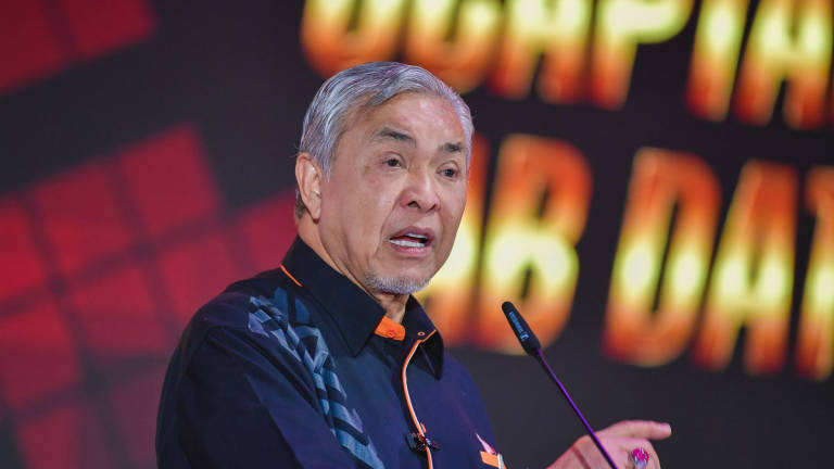 Deputy Prime Minister Datuk Seri Dr Ahmad Zahid Hamidi delivers a speech at the 2025 FELDA Settlers’ Appreciation Ceremony at the Malaysia International Trade and Exhibition Centre (MITEC) today. – BERNAMA