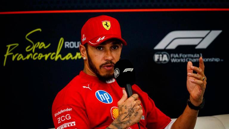 Ferrari’s British driver Lewis Hamilton speaks during a press conference ahead of the Formula One Grand Prix of Belgium at the Spa-Francorchamps circuit in Francorchamps, on July 24, 2025 - Photo by Dimitar DILKOFF / AFP