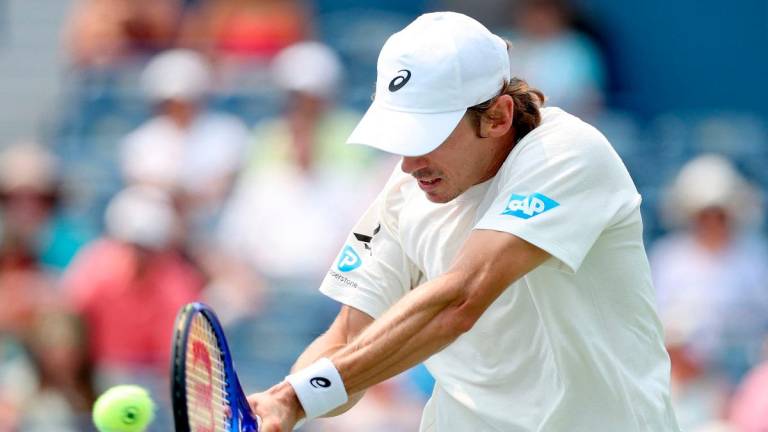 Alex De Minaur of Australia returns a shot to Frances Tiafoe of United States during the National Bank Open Presented by Rogers at Sobeys Stadium on August 03, 2025 in Toronto, Ontario. - Matthew Stockman/Getty Images/AFP