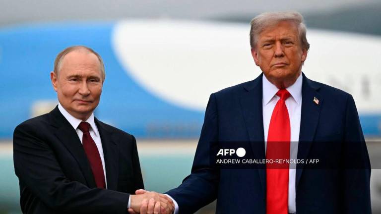 Russian President Vladimir Putin and US President Donald Trump- (Photo by ANDREW CABALLERO-REYNOLDS / AFP)