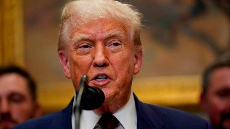 U.S. President Donald Trump delivers remarks in the Roosevelt Room at the White House in Washington, D.C., U.S., July 31, 2025. REUTERS