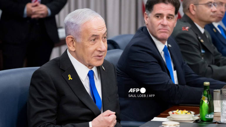 Israeli Prime Minister Benjamin Netanyahu (L) speaks during a meeting with US Secretary of Defense Pete Hegseth at the Pentagon in Washington, DC, on July 9, 2025. - AFP