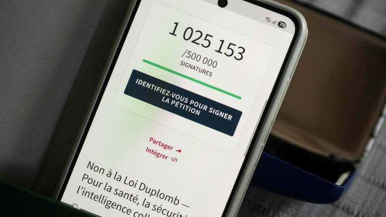 This photograph taken on July 20, 2025 in Le Perreux-sur-Marne, shows a smartphone screen displaying the French National Assembly's website indicating the number of citizens who signed the petition against the Duplomb law 'No to the Duplomb law - for health, safety, collective intelligence', which surpassed today one million signatures, reigniting disputes over this highly contested text, which could become the focus of an unprecedented debate in Parliament if it is not repealed. - AFP