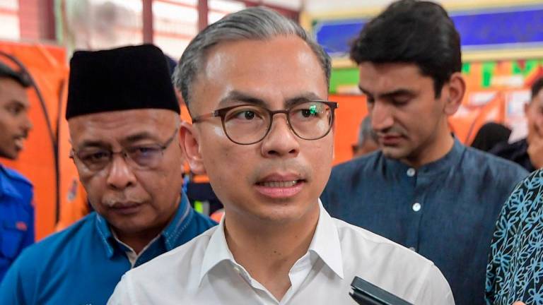 Communications Minister Datuk Fahmi Fadzil. - BERNAMApix